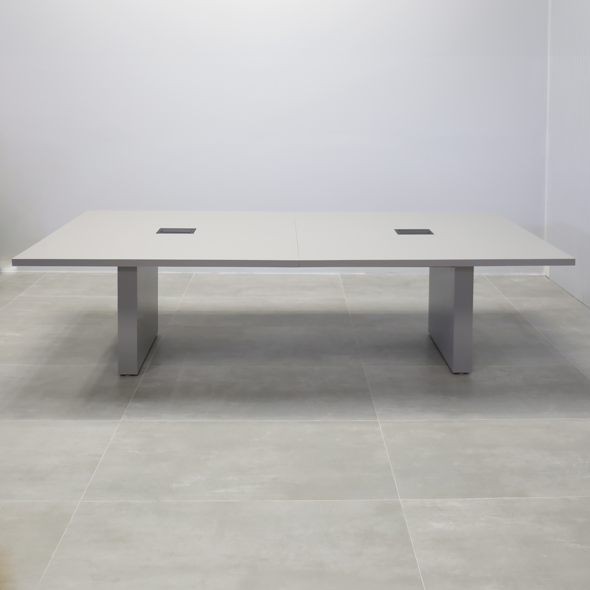 108-inch Newton Rectangular Conference Table with fog gray matte laminate table finish, and black Mx3 power box.
