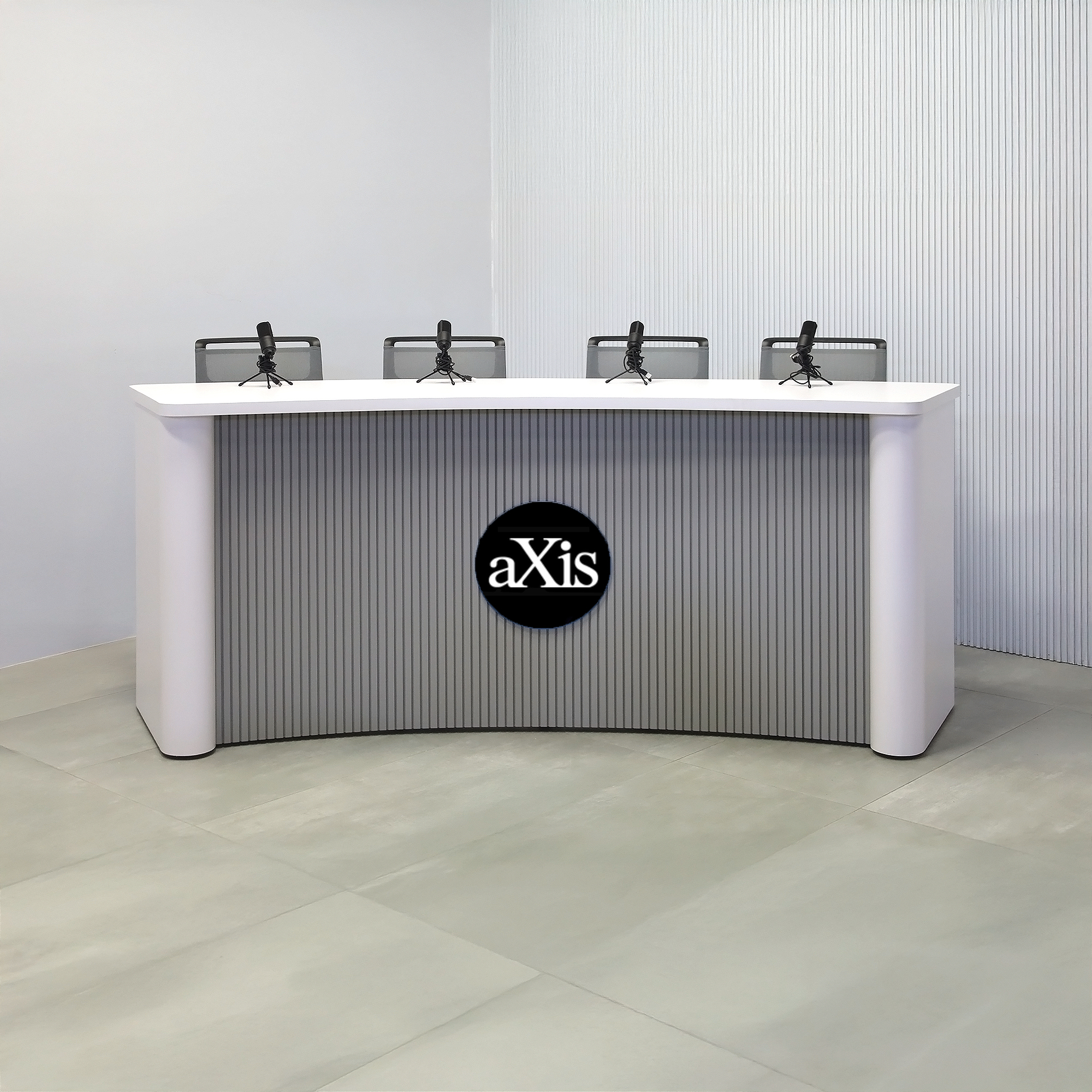 108-inch Moab Custom Podcast Table with White matte laminate top, White matte laminate base, and Fog Gray tambour front. (Logos may be provided by a third party upon request.)