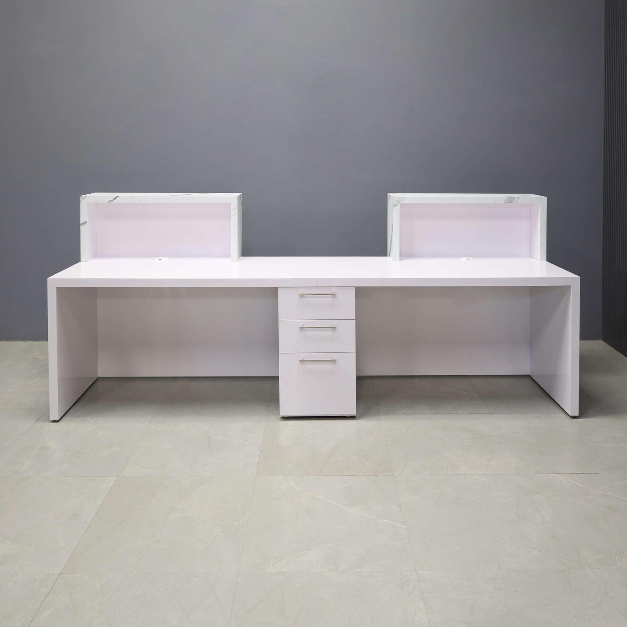 120-inch Los Angeles Double Counter Custom Reception Desk in calcutta stone PVC counters and white matte laminate desks. Built-in storage.