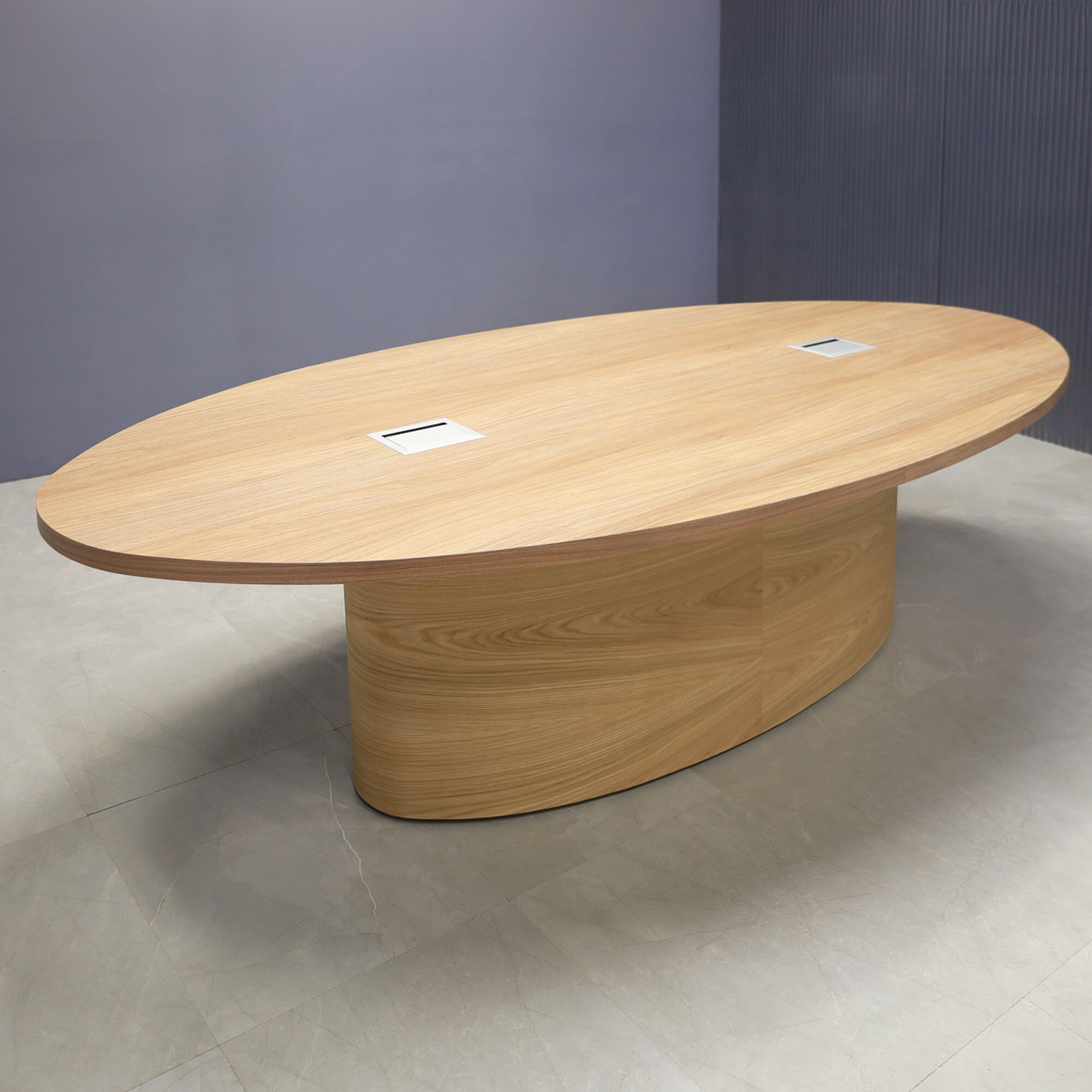 120-inch Newton Oval Conference Table with X2 base in white oak veneer finish (DISCONTINUED)  and two silver Mx3 power boxes.