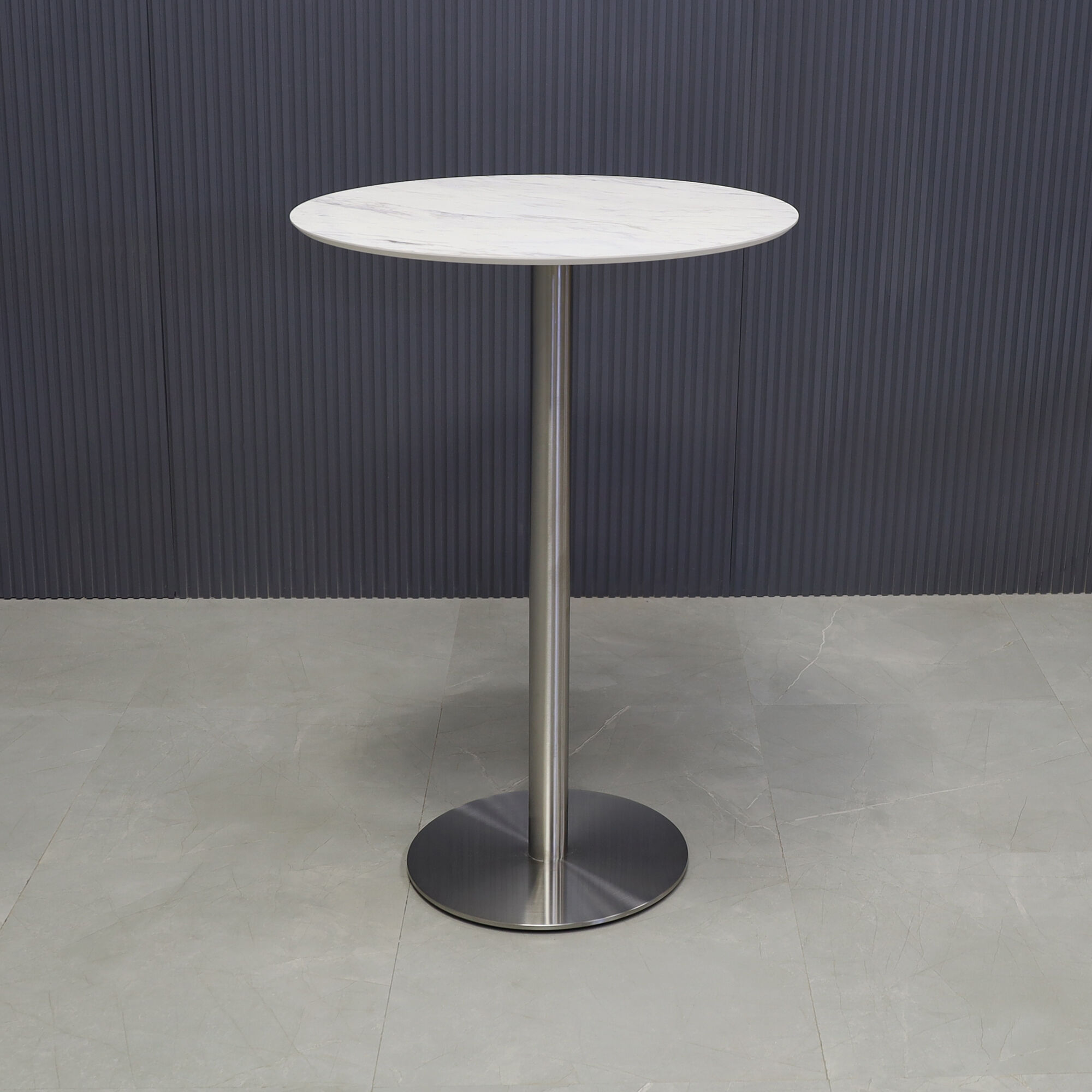 24-inch California Round Engineered Surface Bar Table in 1/2" calcutta blanc engineered surface and brushed stainless steel base, shown here.