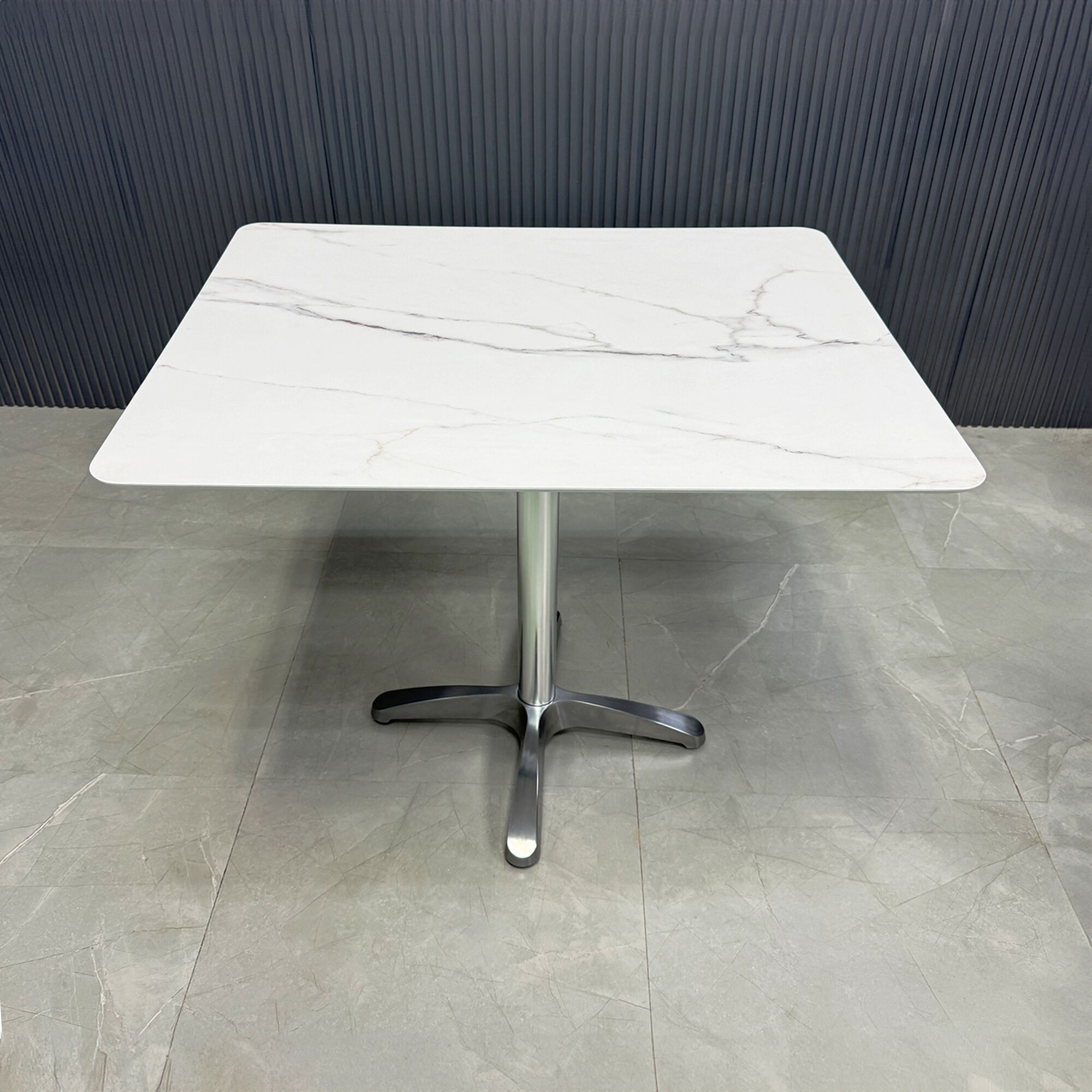 34-inch California Rectangular Cafeteria Table in 1/2-inch solenne marble engineered surface top and aluminum frame base.