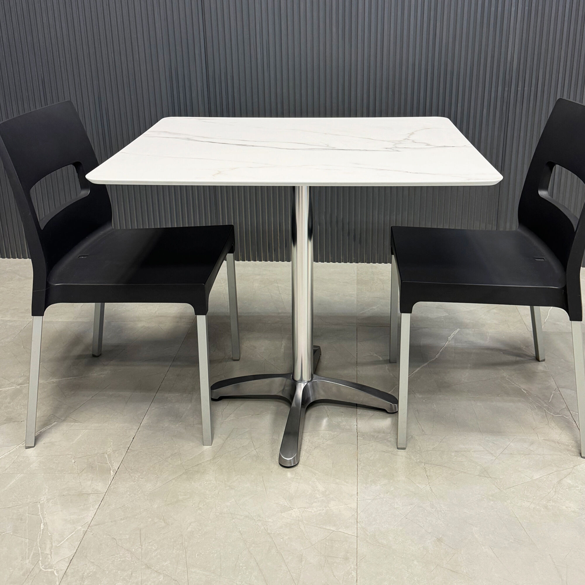 34-inch California Rectangular Cafeteria Table in 1/2-inch solenne marble engineered surface top and aluminum frame base.