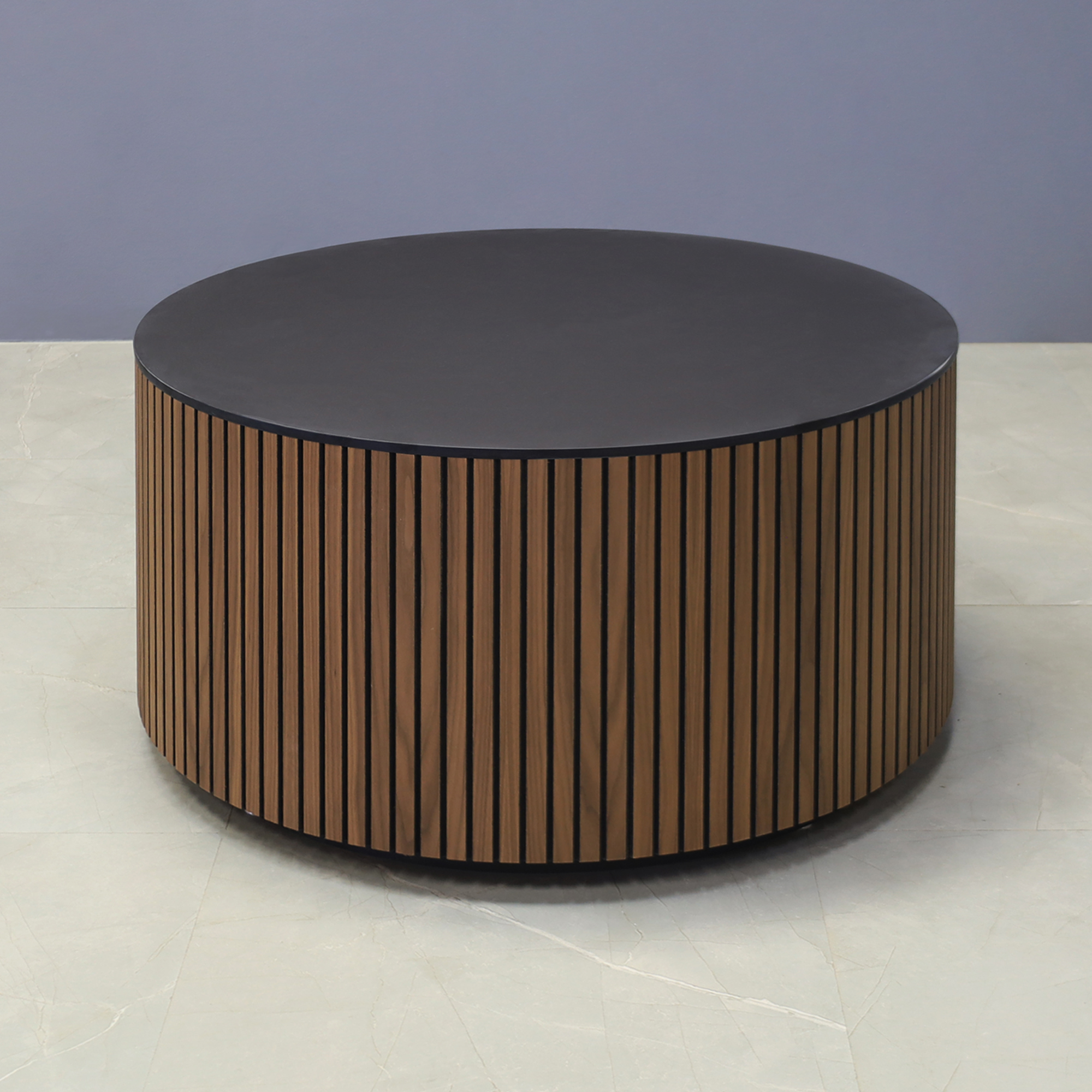 36-inch Nolrfolk Round Lobby Table in 1/2" black traceless engineered stone top, walnut tambour outside and black traceless laminate toe-kick, shown here.