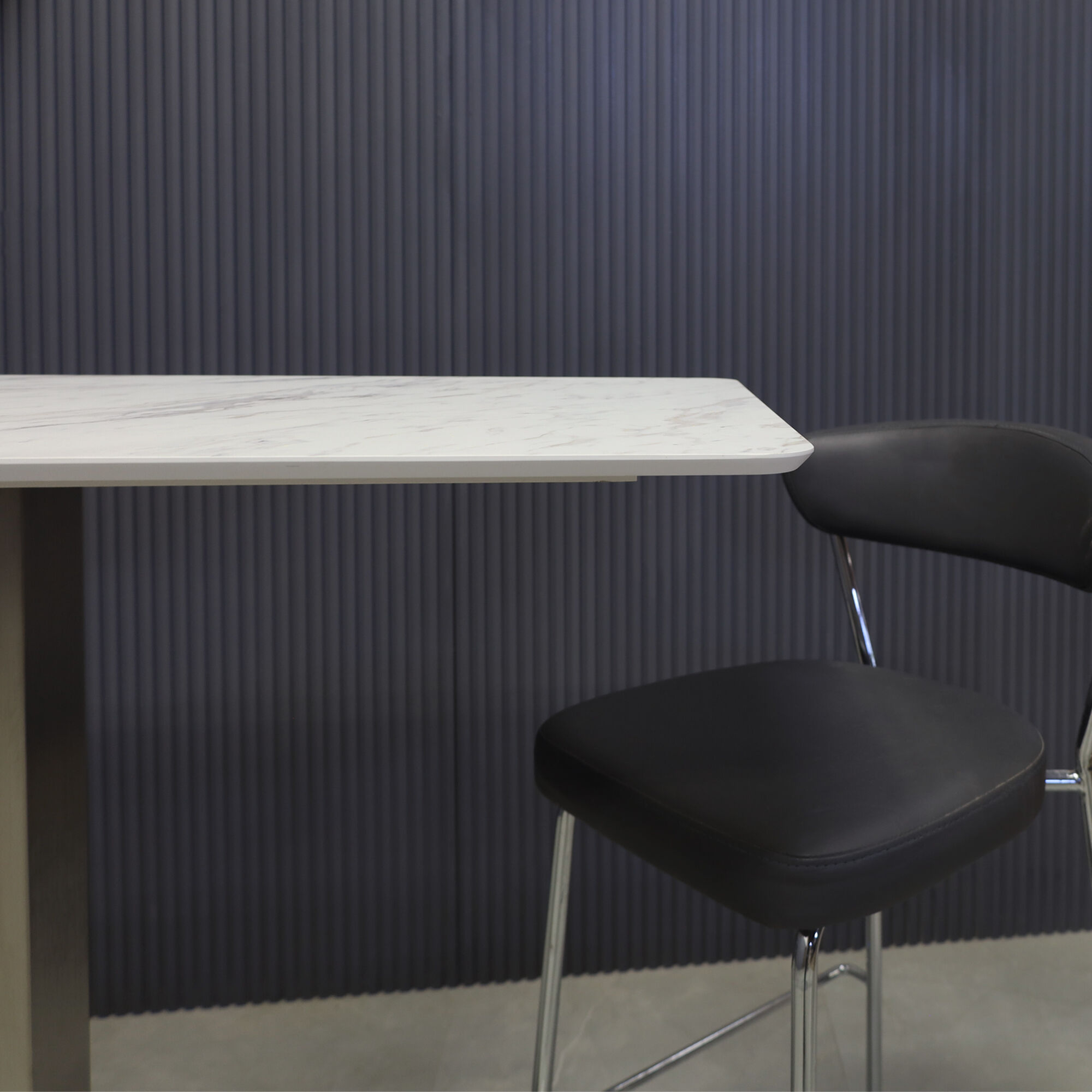42-inch California Rectangular Engineered Surface Bar Table in 1/2" blanc calcutta engineered surface top and brushed stainless steel base, shown here.
