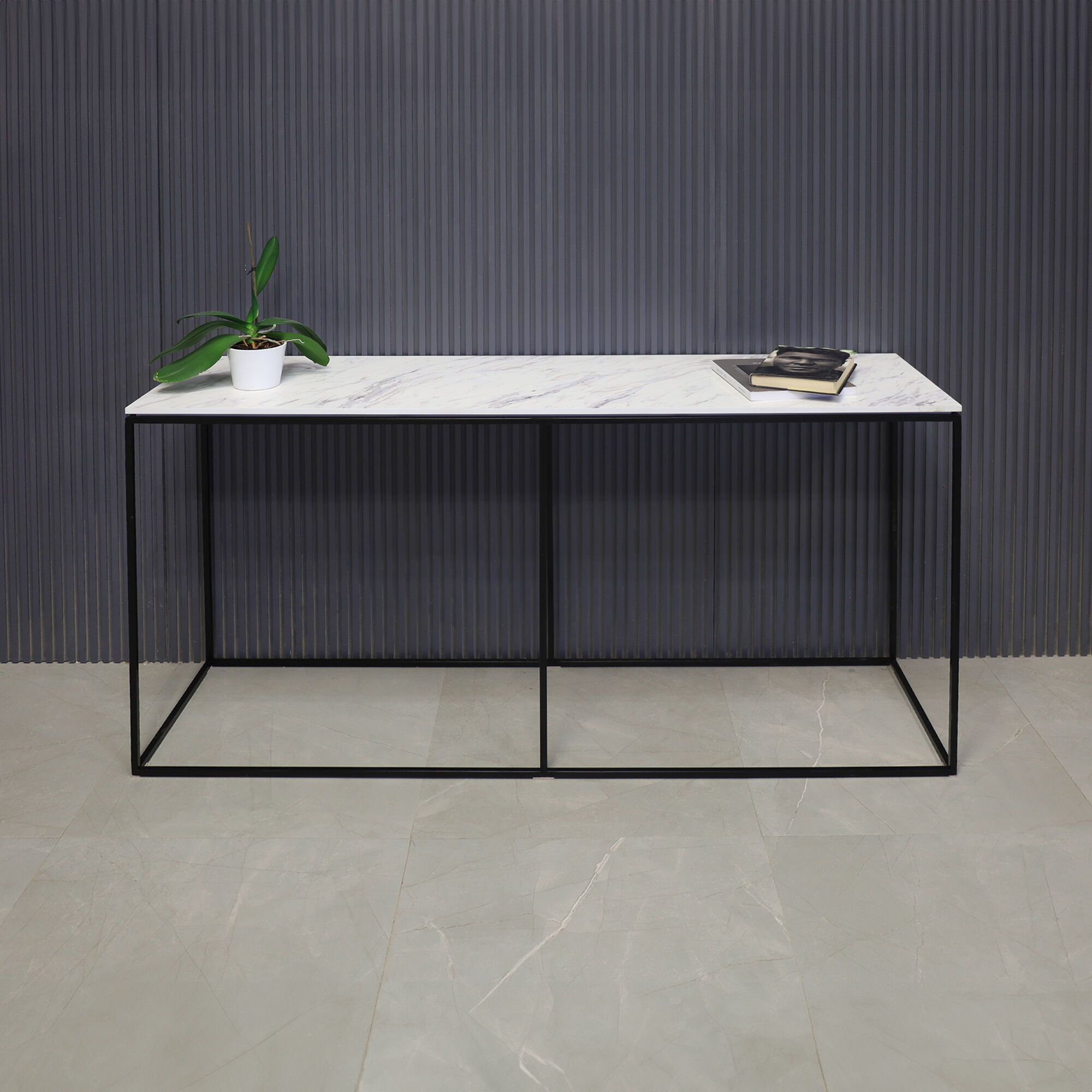 60-inch Aspen Console Table in 1/2" calcutta blanc engineered surface top and black metal frame, shown here.