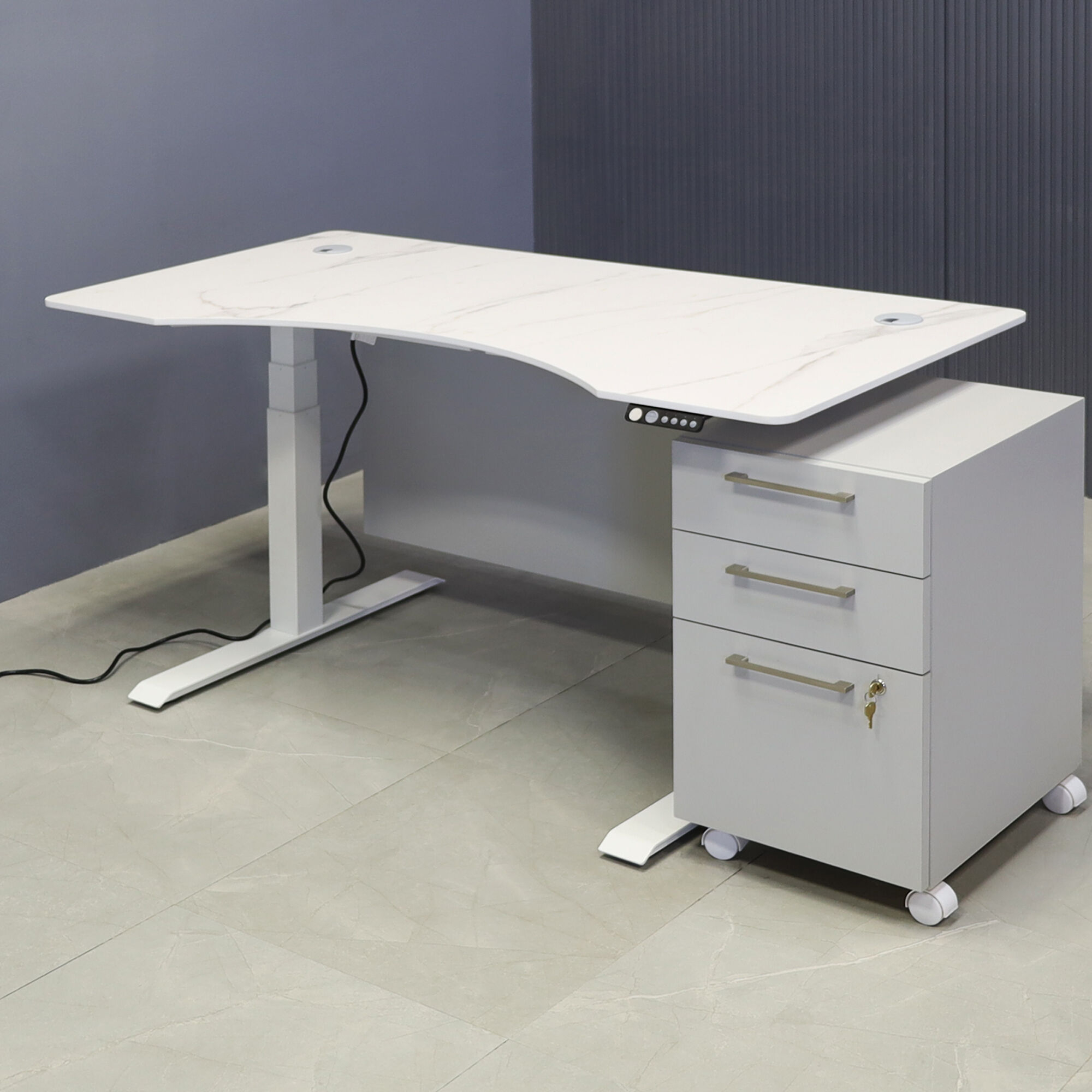 60-inch aXis Sit-stand Executive Desk with 1/2" solenne marble engineered surface top, folkstone gray matte laminate privacy panel and white metal legs shown here.