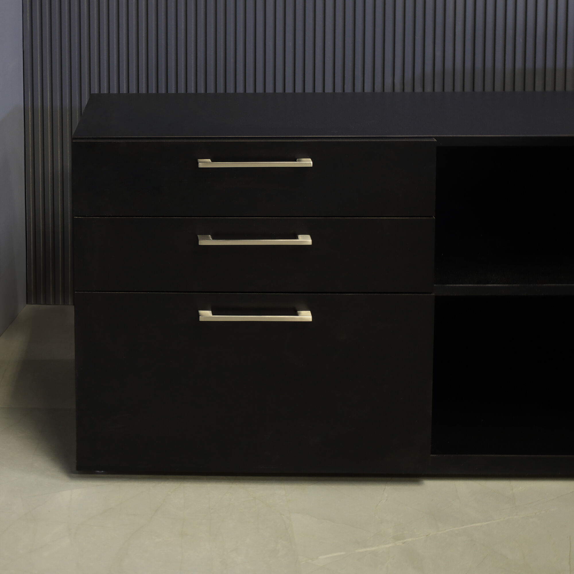 72-inch Avenue Curved Executive Desk with credenza on the right side when sitting, with 1/2" Calcutta blanc engineered surface top, and black matte laminate base, credenza and privacy panel, shown here.