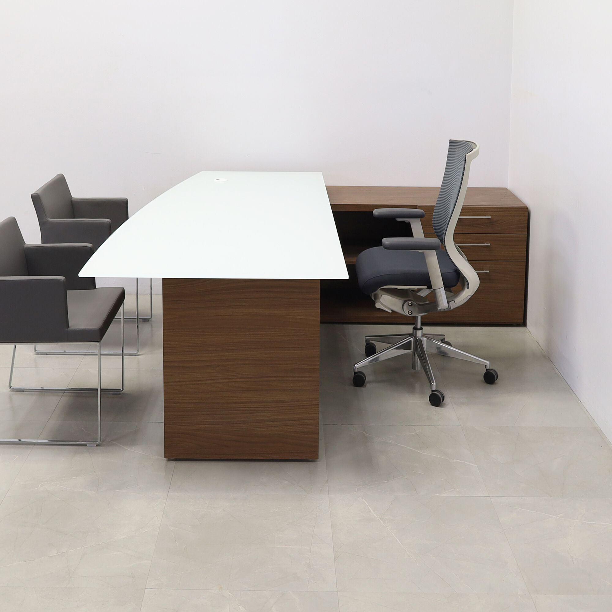72-inch Avenue Curved Executive Desk with credenza on the right side when sitting, with 1/2" white tempered glass top, walnut heights matte laminate base, credenza & privacy panel, shown here.