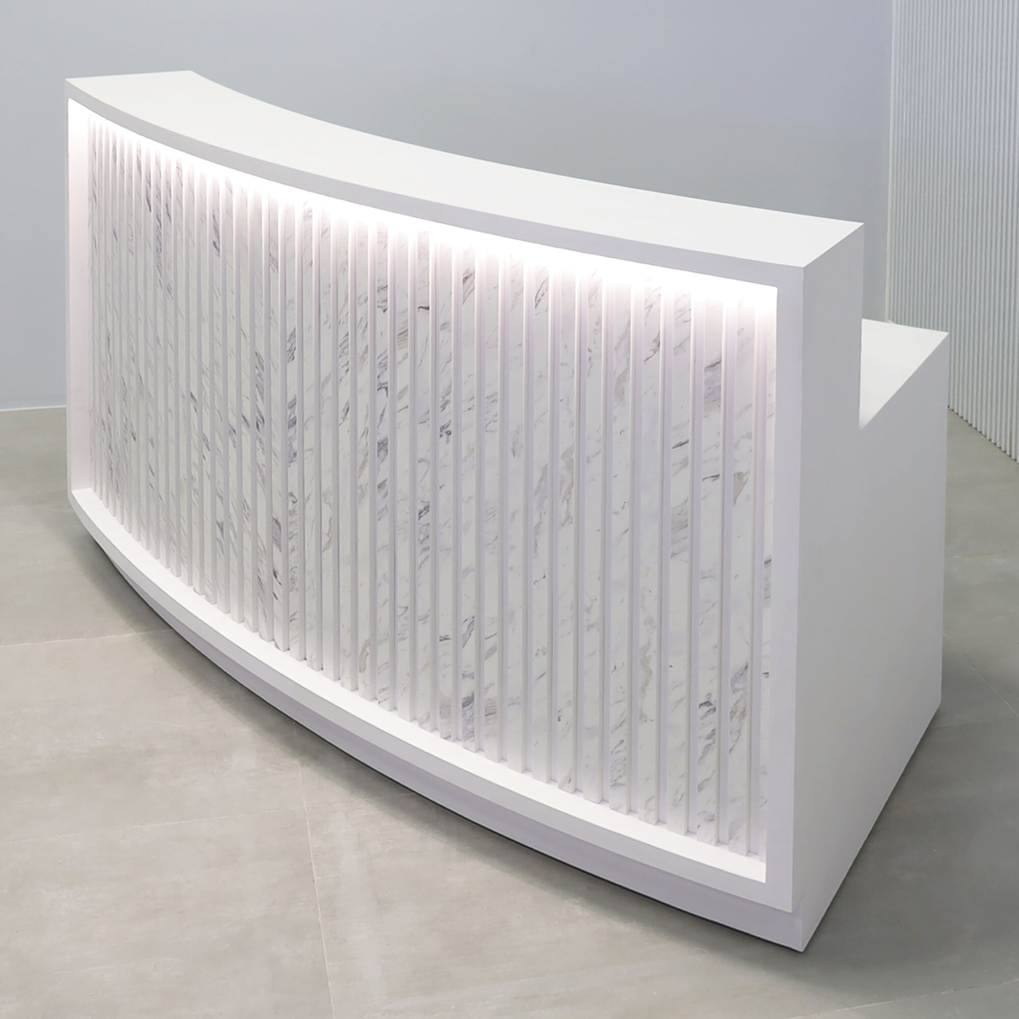 72-inch Seattle X2 Reception Desk in White matte laminate workspace and Engineered Surface Slats, Warm White LED.