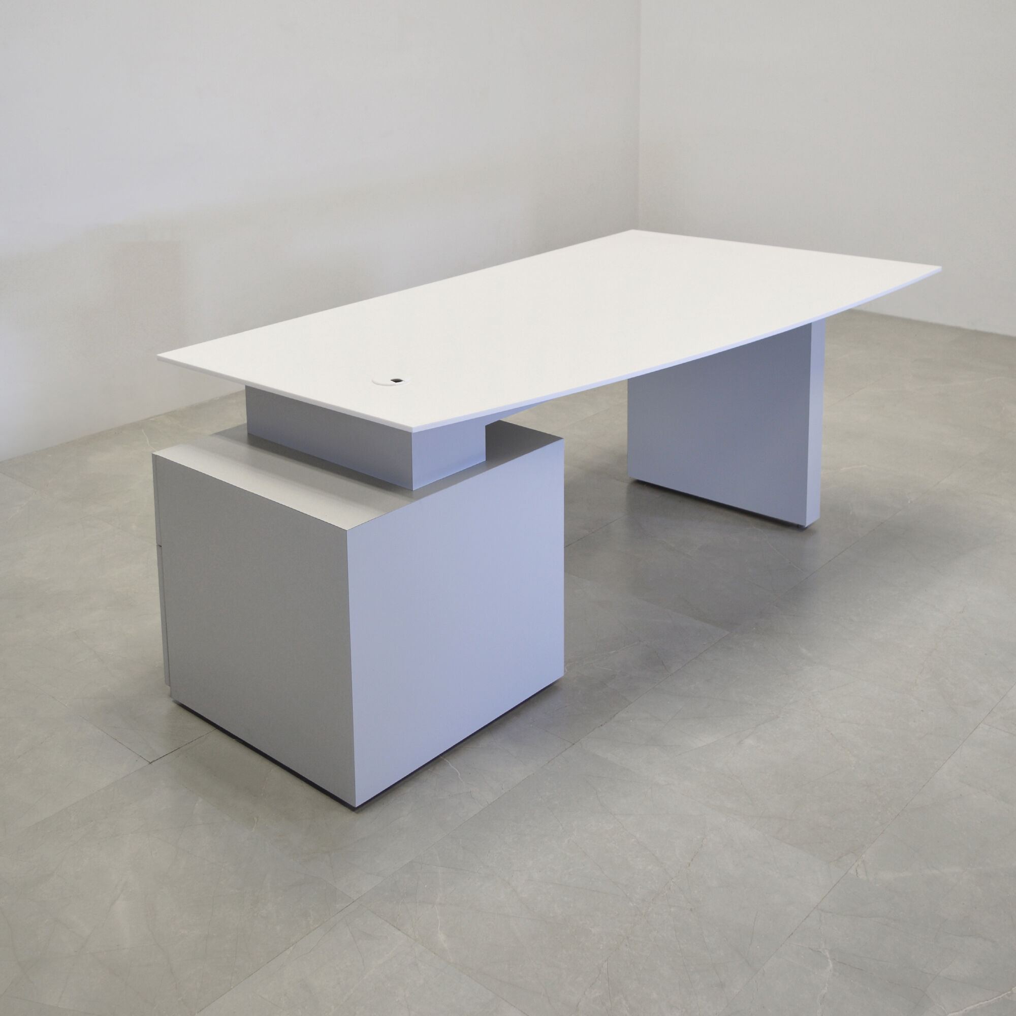 72-inch Avenue Curved Executive Desk with white solid engineered surface top, and folkstone gray matte laminate base.