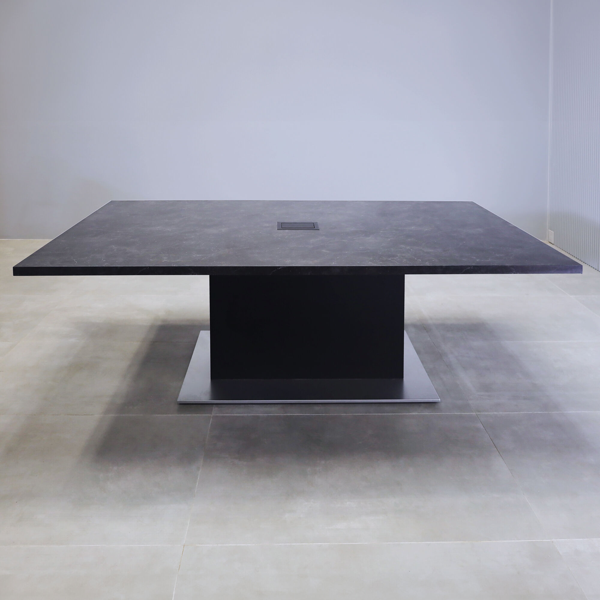 90-inch Aurora Rectangular Conference Table with black amani engineered surface top, black traceless laminate pedestal, metal powder coated silver base and black MX3 power box.