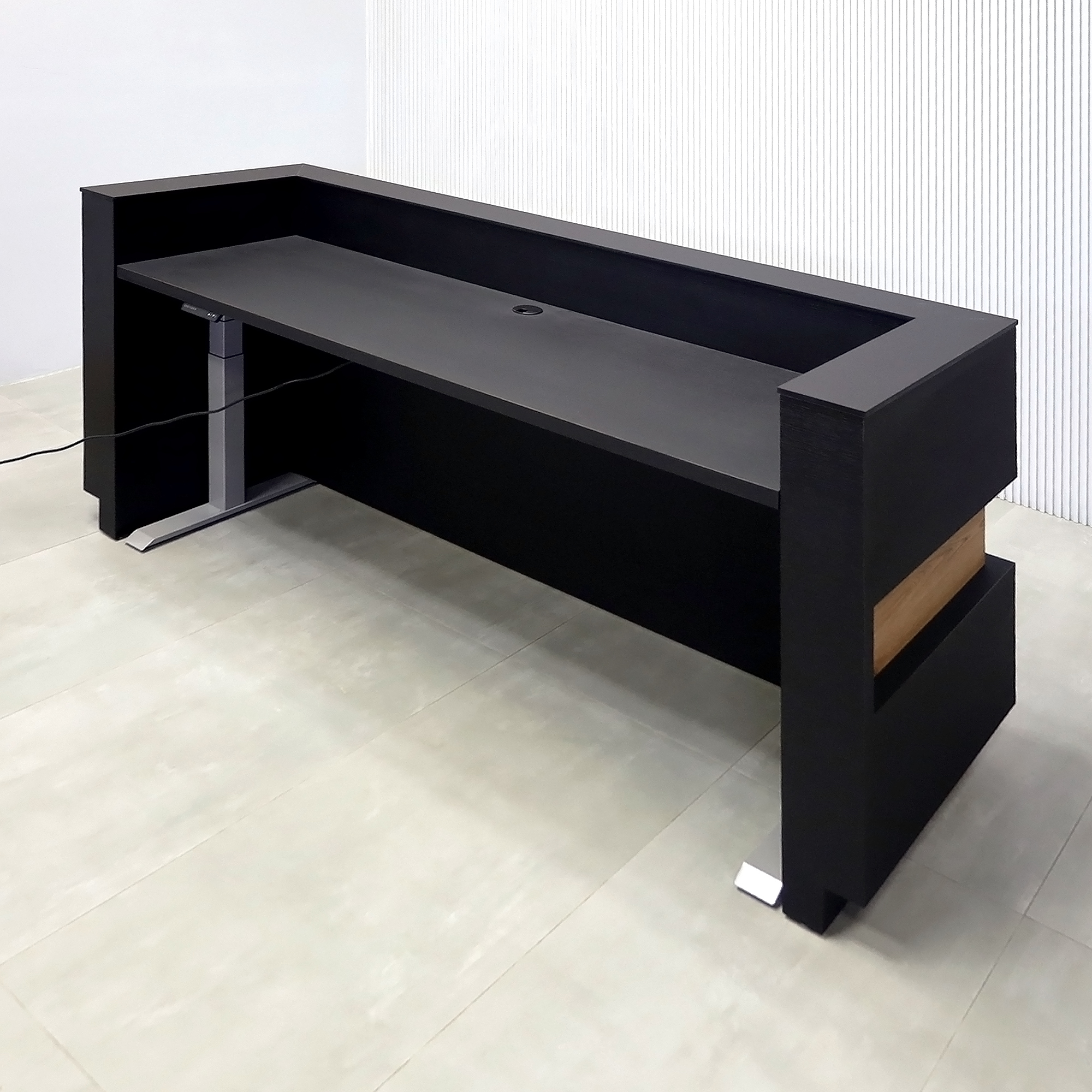 90-inch Pensacola U-Shape Reception Desk with Black Cinder matte laminate desk and toe-kick. Spiced Chestnut laminate accent, Black Traceless engineered surface top, and White LED.