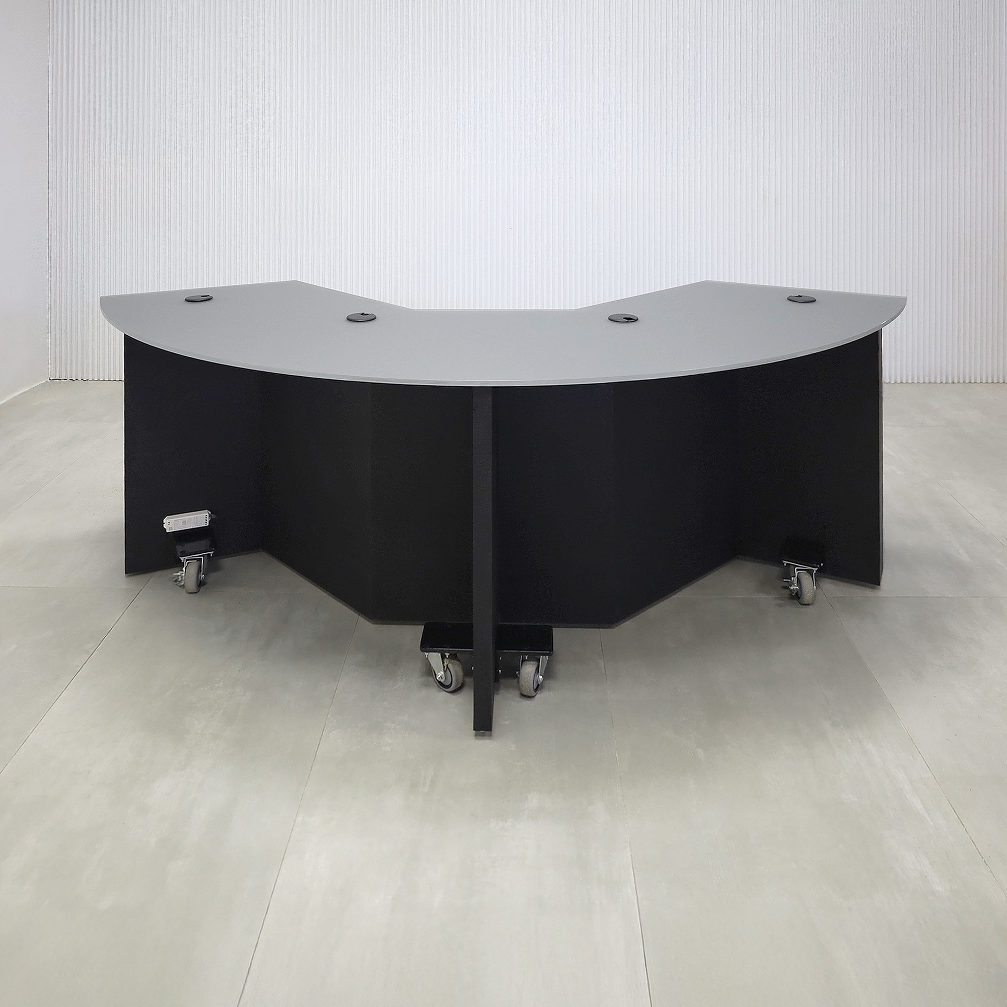 90-inch Tampa Bay Podcast Table with Satin Glass Dark Gray Storm Sky top, Black Traceless Laminate front base, Black Cinder Matte Laminate back base, Colored LED.