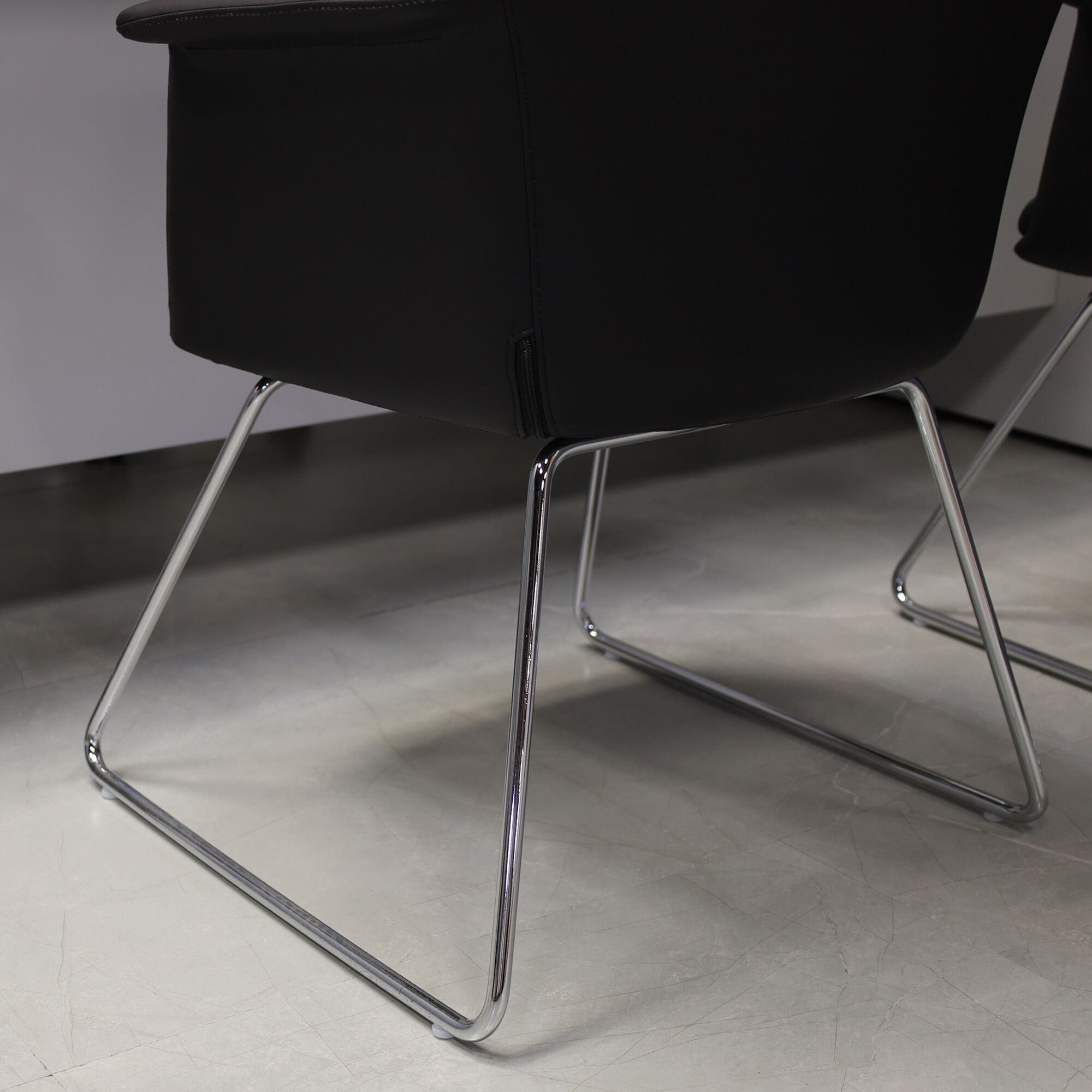 Archi Guest Chair in black upholstery, shown here.