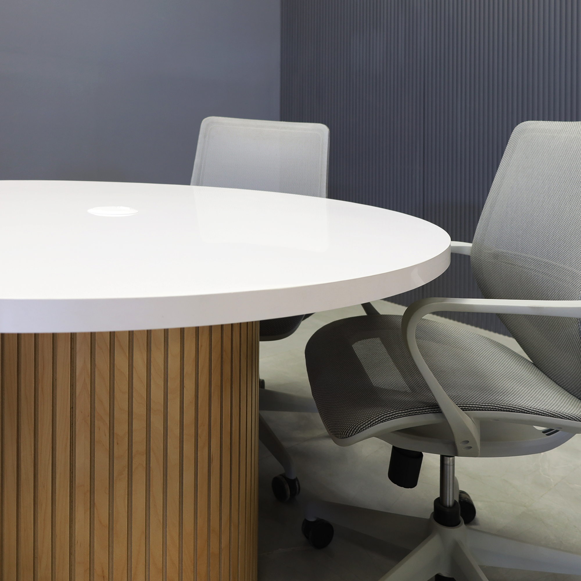 Laminate conference table with a round top and X3 base